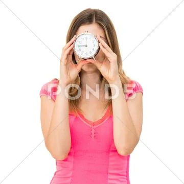 Woman holding alarm clock Stock Photos