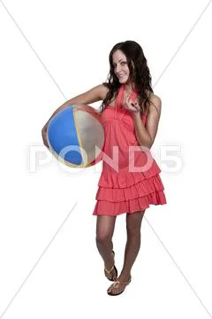 Woman Holding Beachball Stock Photos