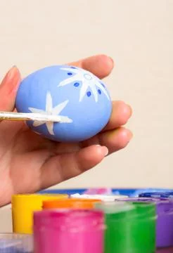 Woman holding easter egg Stock Photos