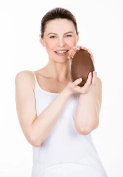 Woman holding easter egg Stock Photos
