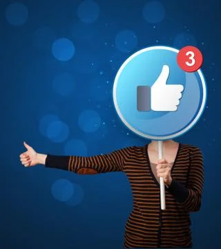 Woman holding facebook sign Stock Photos