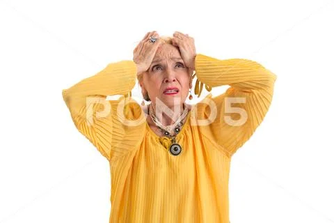 Woman holding head in desperation. Stock Photos