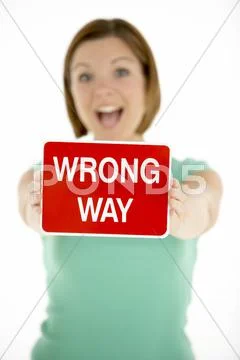 Woman Holding Road Traffic Sign Stock Photos