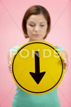 Woman Holding Road Traffic Sign Stock Photos