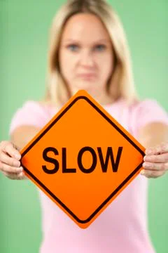 Woman Holding Road Traffic Sign Stock Photos