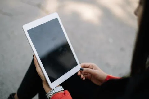 Woman holding a tablet with empty screen Foto stock