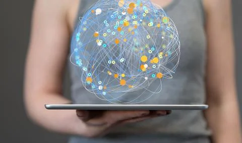 Woman holding a tablet with a floating render of global network Stock Photos