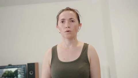 Woman at home performs exercises using dumbbells. Stock-Footage 194672723