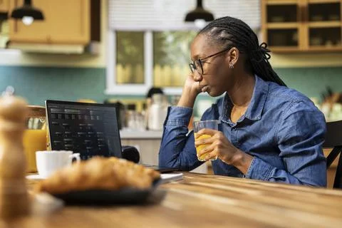 Woman at home, software developer, writing code, and debugging applications Foto stock