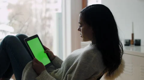 Woman at home with tablet computer Video stock 53087559
