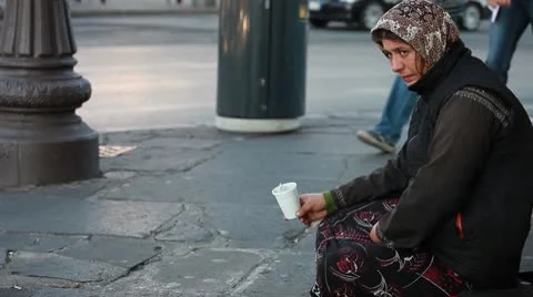 Woman homeless in city begging Stock Footage