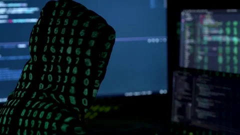 Woman in hood is hacking password. Programmer software developer is writing c Stock Footage 149298827