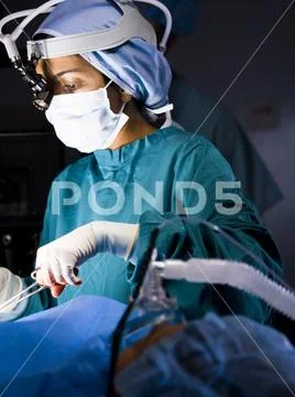 Woman In Hospital With Respirator