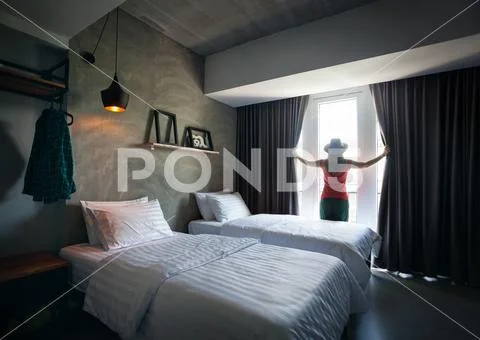 Woman in Hotel Room Stock Photos