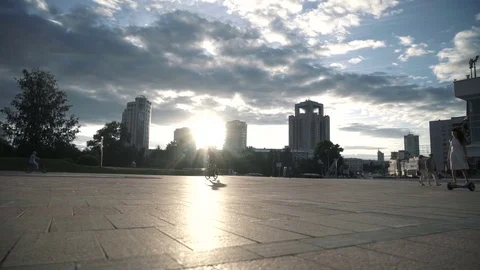 Woman on hoverboard in back lit Stock Footage 78463562