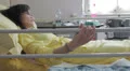 woman ill and sad - hospital - ill - illness - sick HD Footage