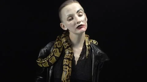 Woman in image with pythons Stock-Footage 89308798