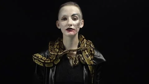 Woman in image with two snakes Stock Footage 89306575
