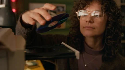 Woman Inserting CD-rom Disk into Drive while Working on Retro PC Stock Footage 327235593