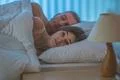 The woman with insomnia lay near the man Photo