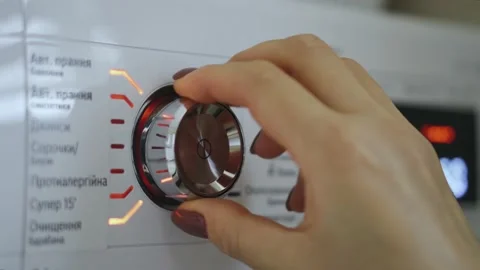 Woman installs the program to the correct version and presses the start button Stock Footage 153803592