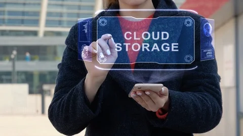 Woman interacts HUD Cloud storage Stock Footage 121314864