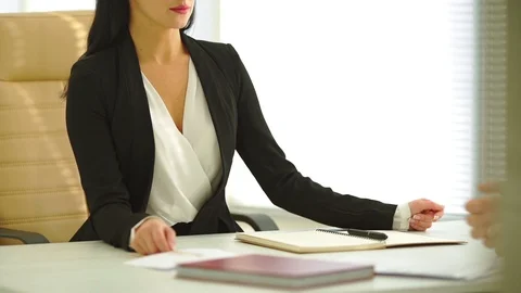 The woman is interviewing at the table. slow motion Video stock 105200717