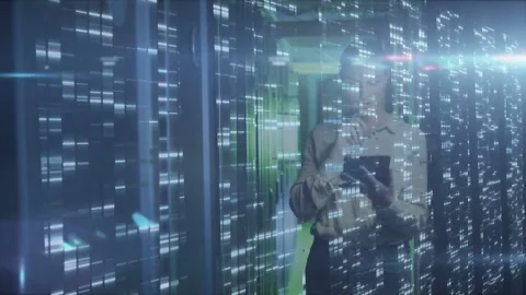 Woman IT engineer tapping tablet and lifting stylus activating data overlay Stock Footage 332577676