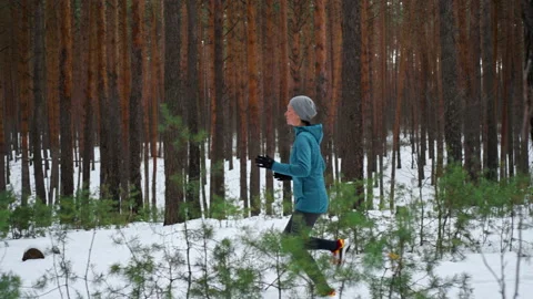 Woman jogging in forest Stock Footage 219307451