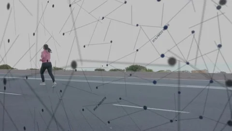 Woman jogging on road with frames moving, node network appearing, obscuring Stock Footage 334242343