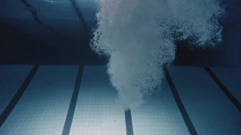 Woman jumping into the pool Stock Footage 283094744