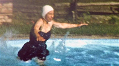 WOMAN JUMPS Swimming Into Pool Dive Slow Motion 1955 Vintage Film Home Movie 314 Stock Footage