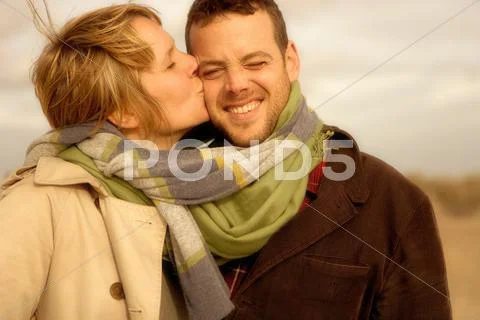 Woman Kissing Man On Beach Scarves Mixed