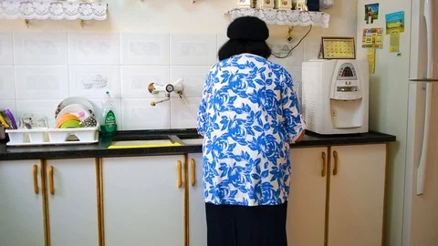 Woman in kitchen Video stock 89482435