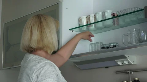 Woman in the kitchen Stock-Footage 110945123