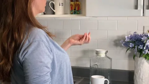 Woman in a Kitchen Stock Footage 137215028