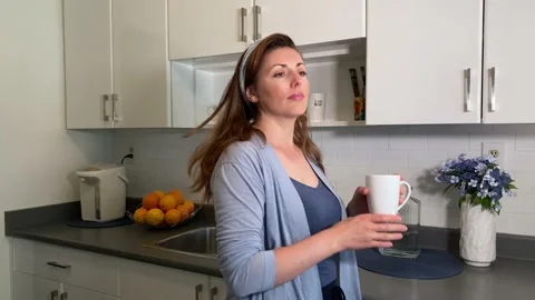 Woman in a Kitchen Stock Footage 137215064