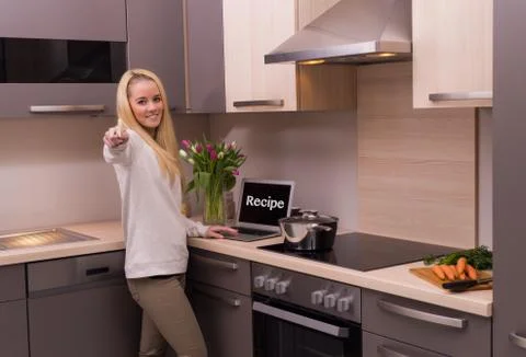 Woman in kitchen Stock Illustration