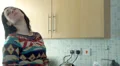 Woman in kitchen upset, bad mood, talking to someone HD Footage