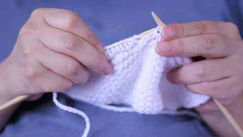Woman Knitting Stock Footage 1048571
