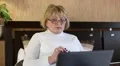 Woman with laptop and cell phone HD Footage