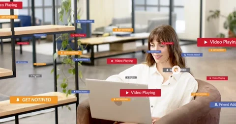 Woman with laptop hovering cursor, clicking play to reveal tech badges Stock Footage 321782033