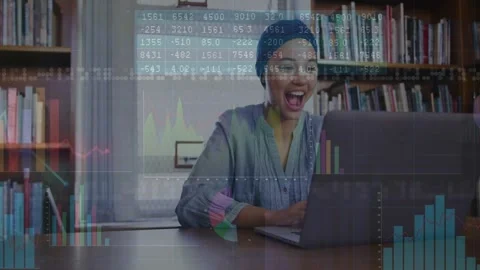 Woman at laptop viewing analytics update, reacting and celebrating as animated Stock Footage 330161765