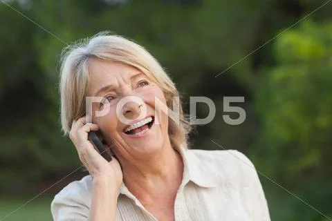 Woman Laughing On The Phone