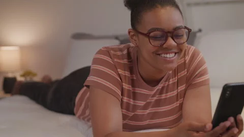 Woman Laughs Talking On Facetime Stock Footage 208765784