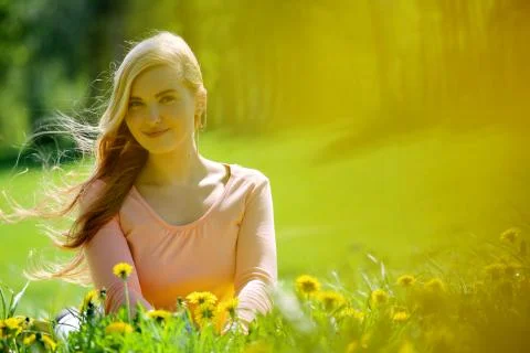 Woman laying in spring park 스톡 사진