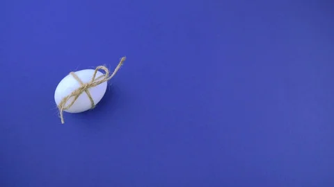 Woman lays an easter egg. Stock Footage 122312181
