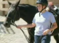 Woman Leading Horse SD Footage