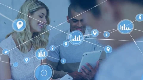 Woman leaning in while man tapping tablet, initiating data analytics icon Stock Footage 334178303