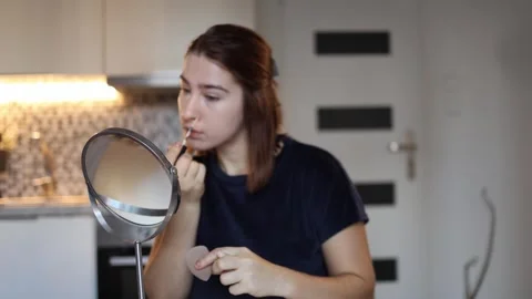 Woman learning basic makeup Stock Footage 328042904